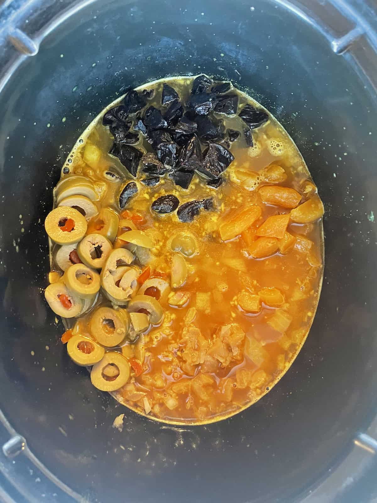 Slow-Cooker Chicken Tagine with Dried Fruit, Olives and Chickpeas.add dried fruit, olives and preserved lemons to slow cooker