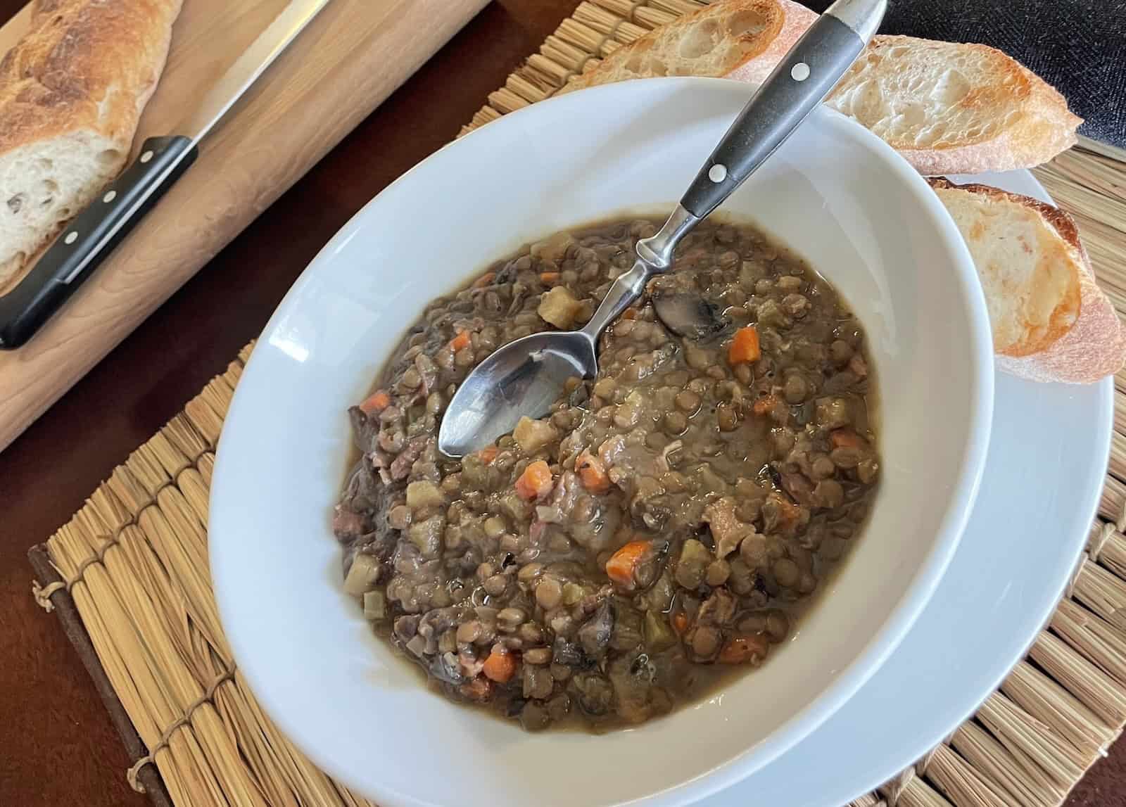 Aromatic Lentil and Ham Soup with Apples and Mushrooms -- finished in a soup bowl