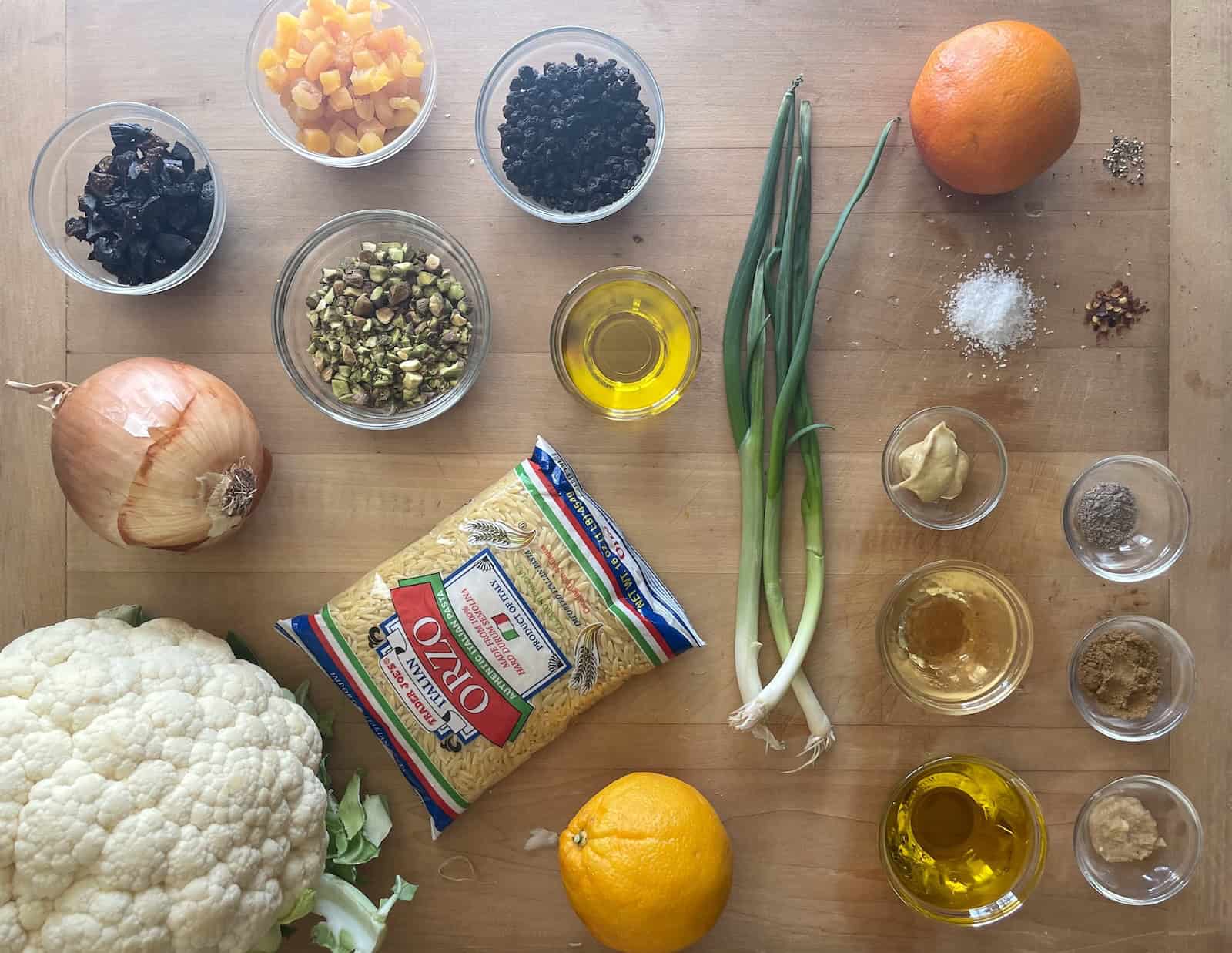 Orzo Salad with Roasted Cauliflower, Dried Fruit, and Pistachios in Citrus and Cumin Dressing ingredients