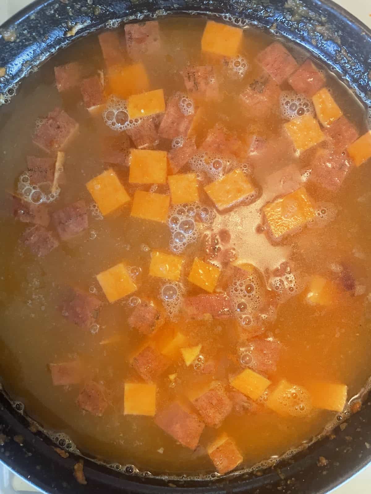 West African Peanut Soup with Chicken and Chickpeas adding sweet potatoes and chicken broth