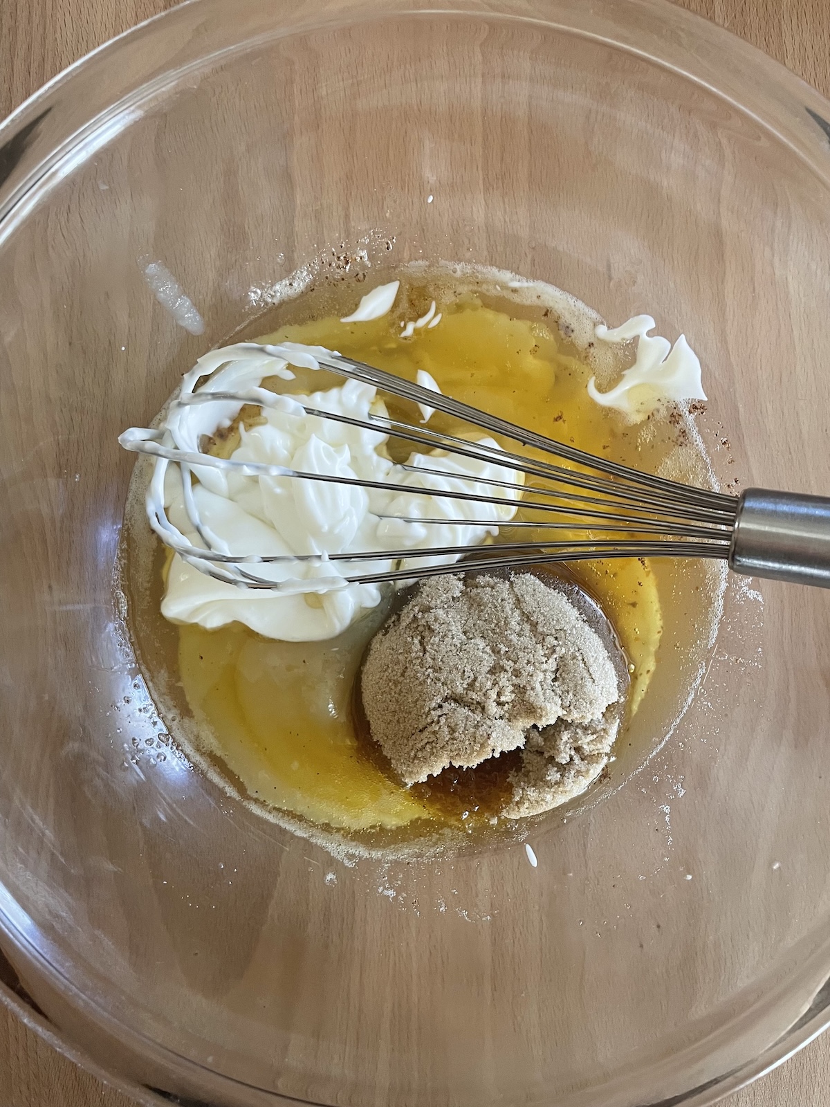 adding sour cream and brown sugar to bowl