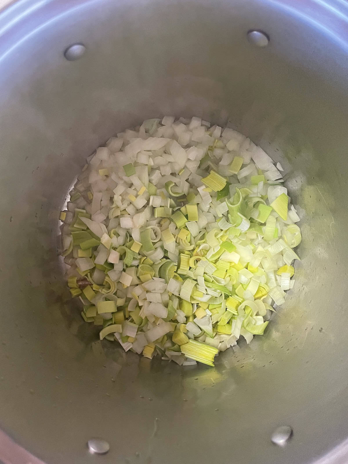 onions and leeks sautéing in butter