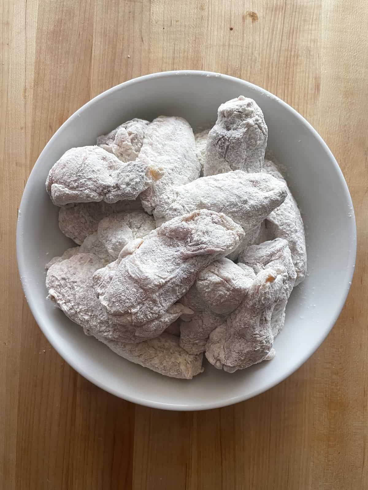 Polynesian Chicken Wings with Pineapple Mustard Sauce -- flour coated wings