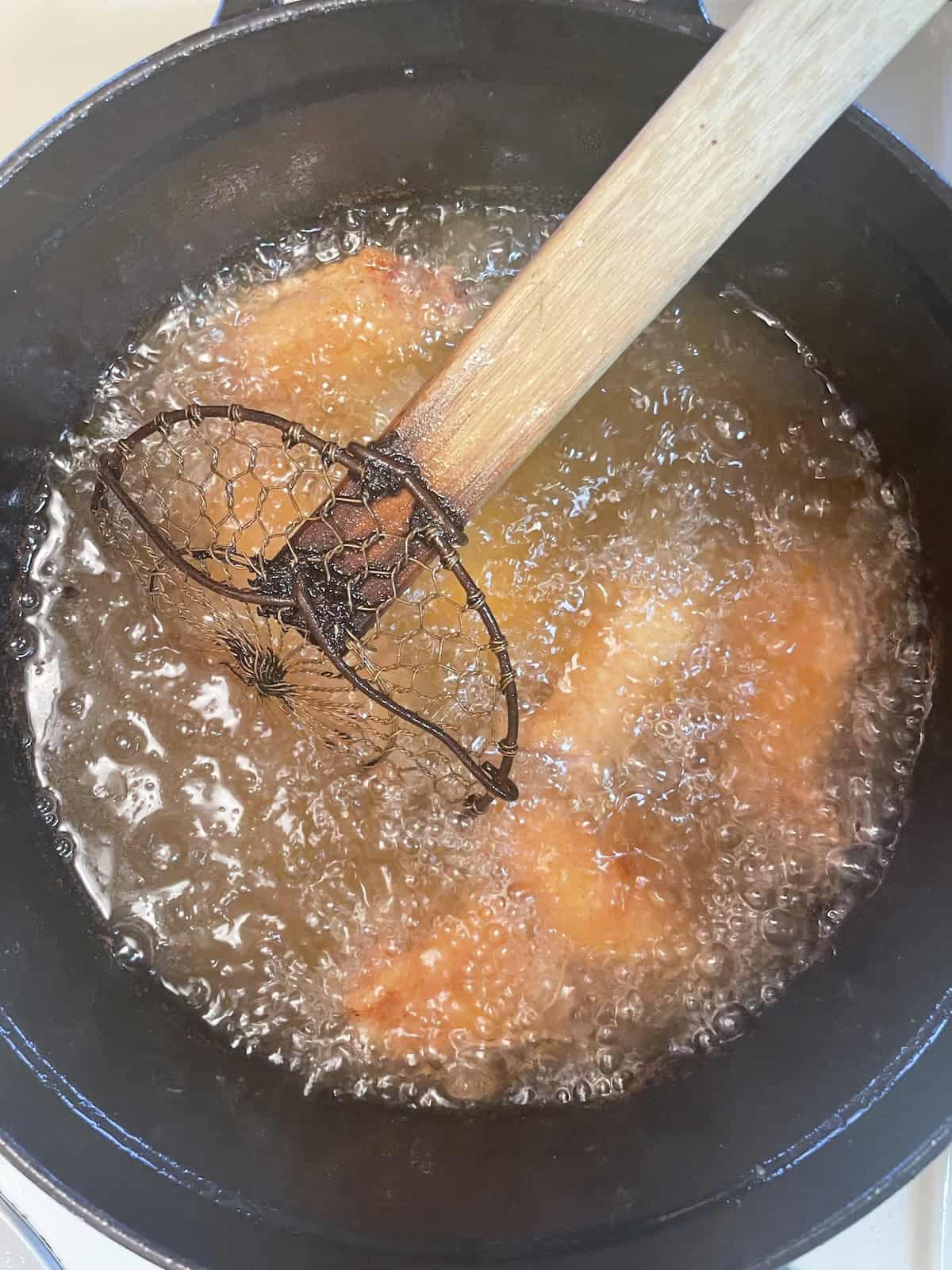 Polynesian Chicken Wings with Pineapple Mustard Sauce - frying wings