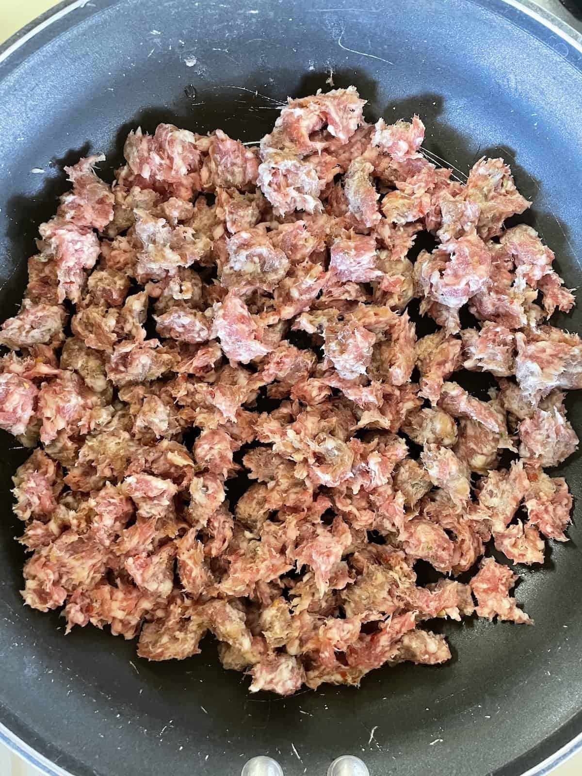 Sausage and Mushroom Rigatoni with Marsala and Parmesan -- sausage in skillet