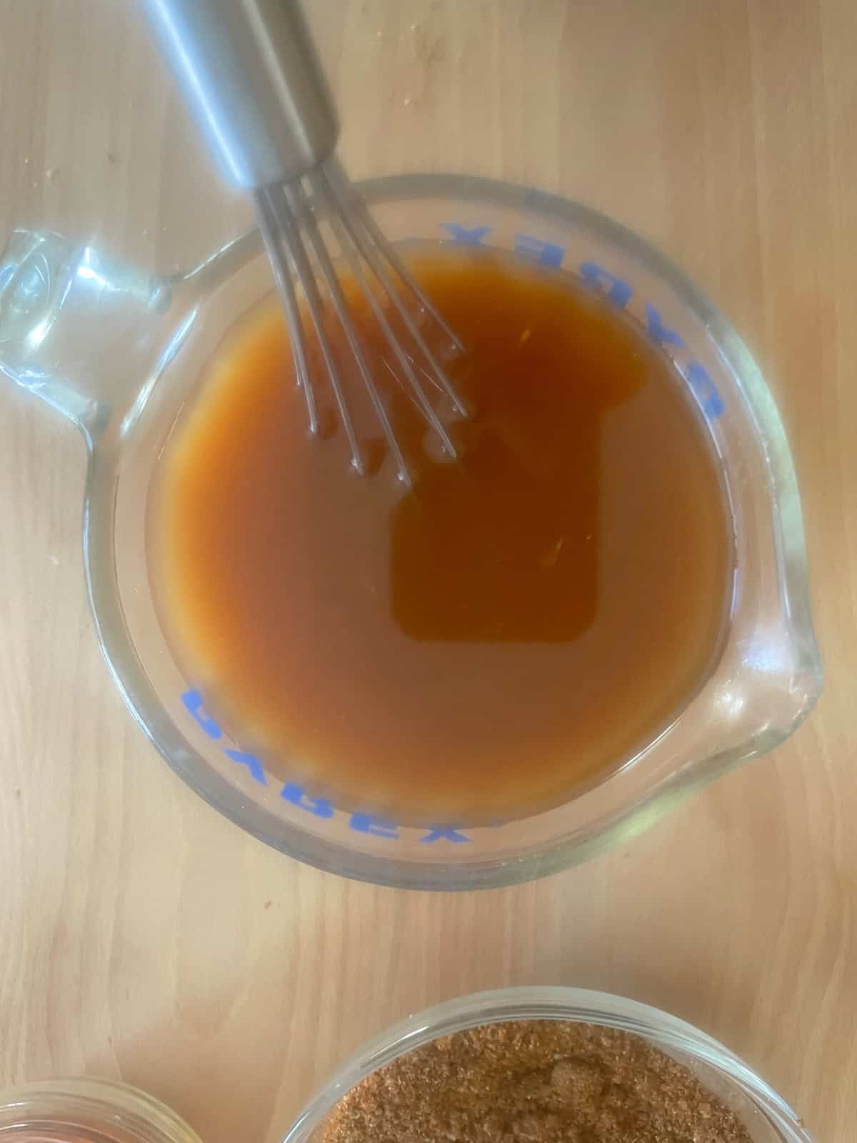 chicken broth, chipotle, adobo, tomato paste and espresso mixed in a measuring cup