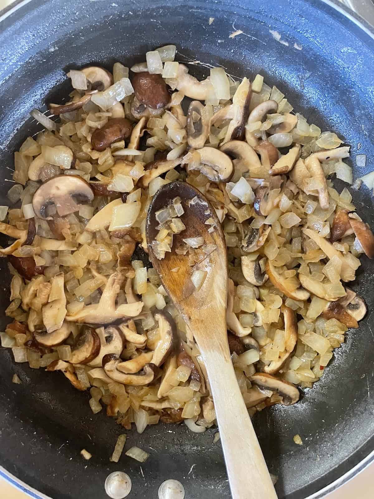 Sausage and Mushroom Rigatoni with Marsala and Parmesan - sautéing mushrooms