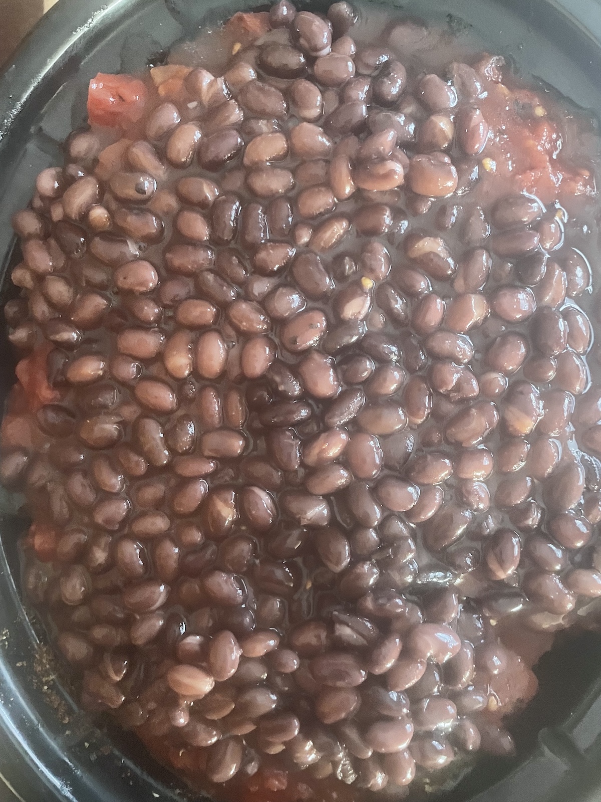 tomatoes and beans added to slow cooker