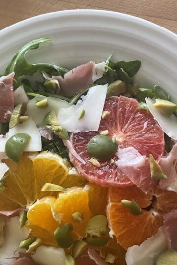 Arugula Salad with Oranges, Serrano Ham and Manchego Cheese in Citrus Dressing