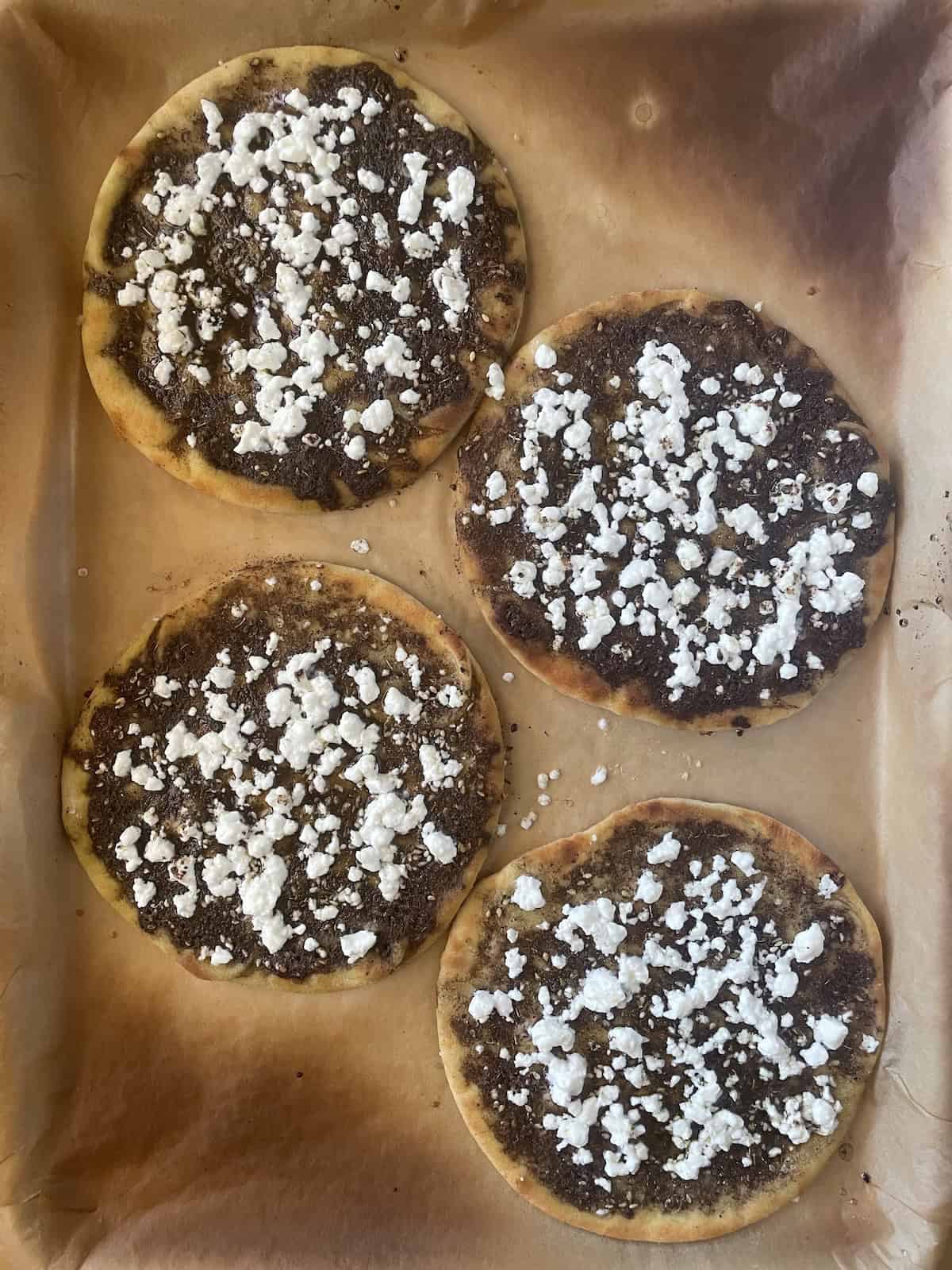 za'atar and feta topped pita baked