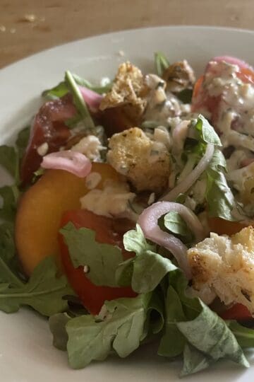 Heirloom Tomato, Peach and Arugula Salad with Miso Buttermilk and Herb Dressing, Mustard Croutons and Pickled Shallots