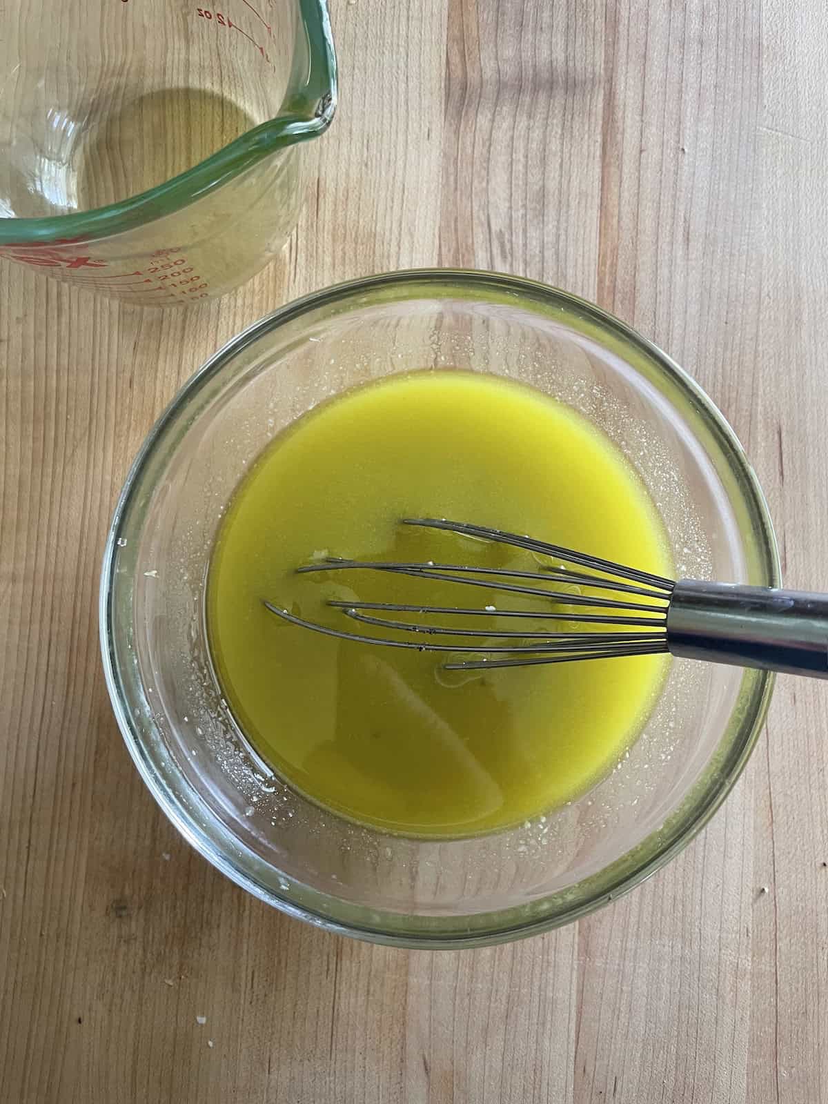 whisk in the olive oil
