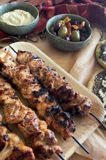 Yogurt, Harissa and Aleppo Pepper Chicken Kebabs with Za’atar and Feta Pita Bread
