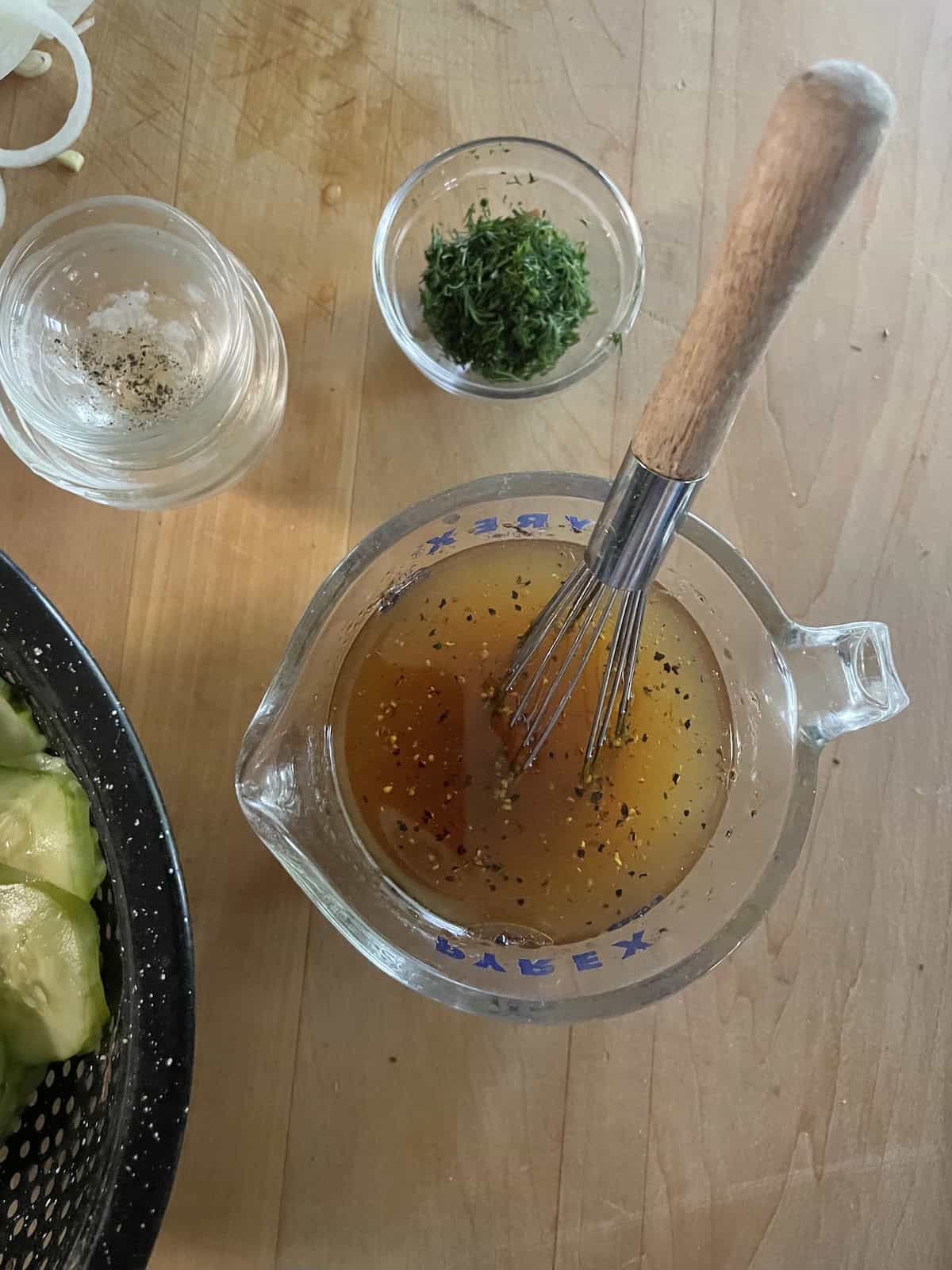 whisking dressing ingrediens
