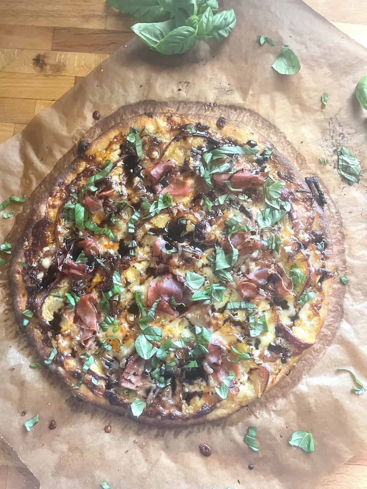pizza sprinkled with basil