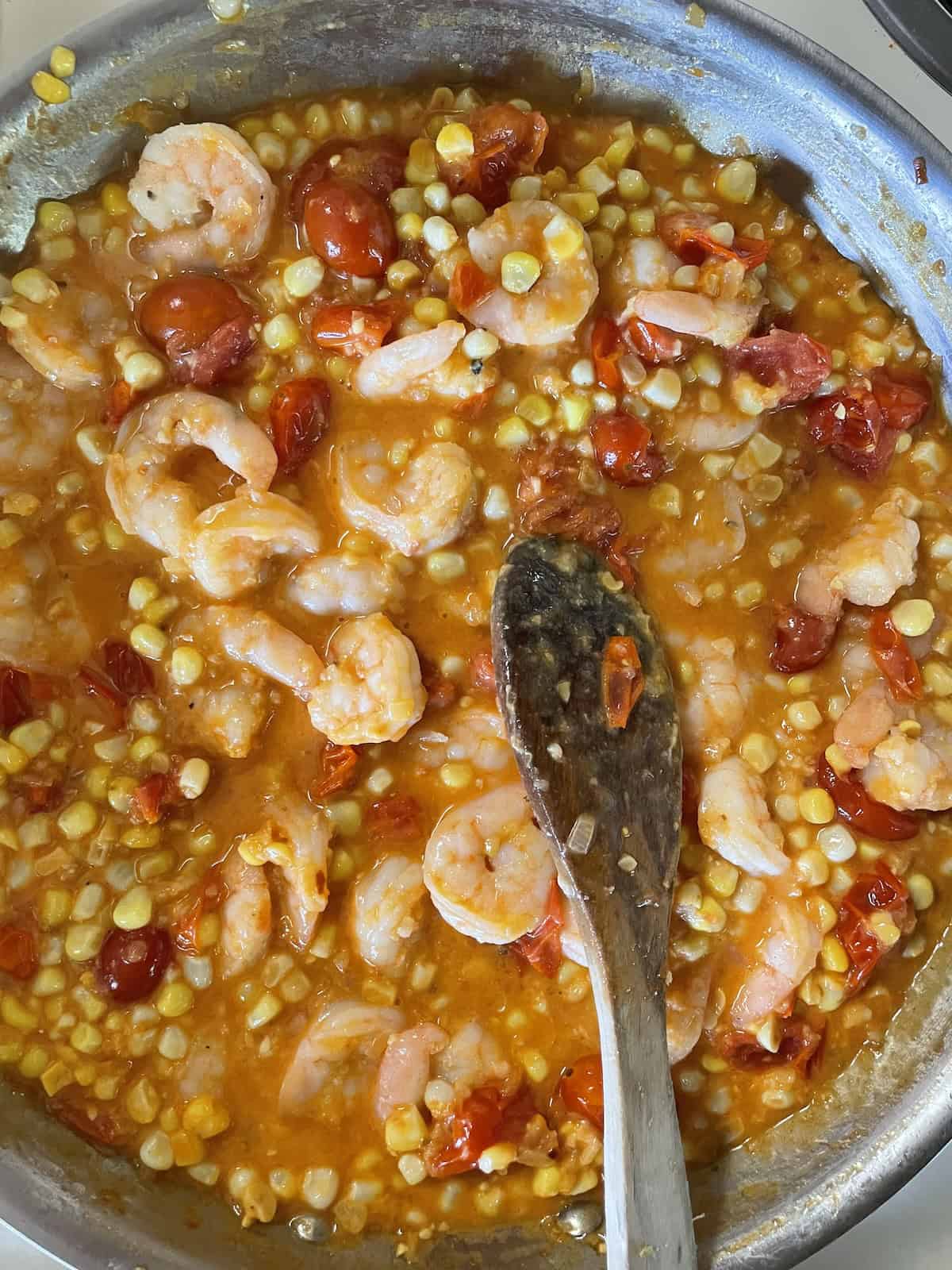 adding shrimp back into sauce