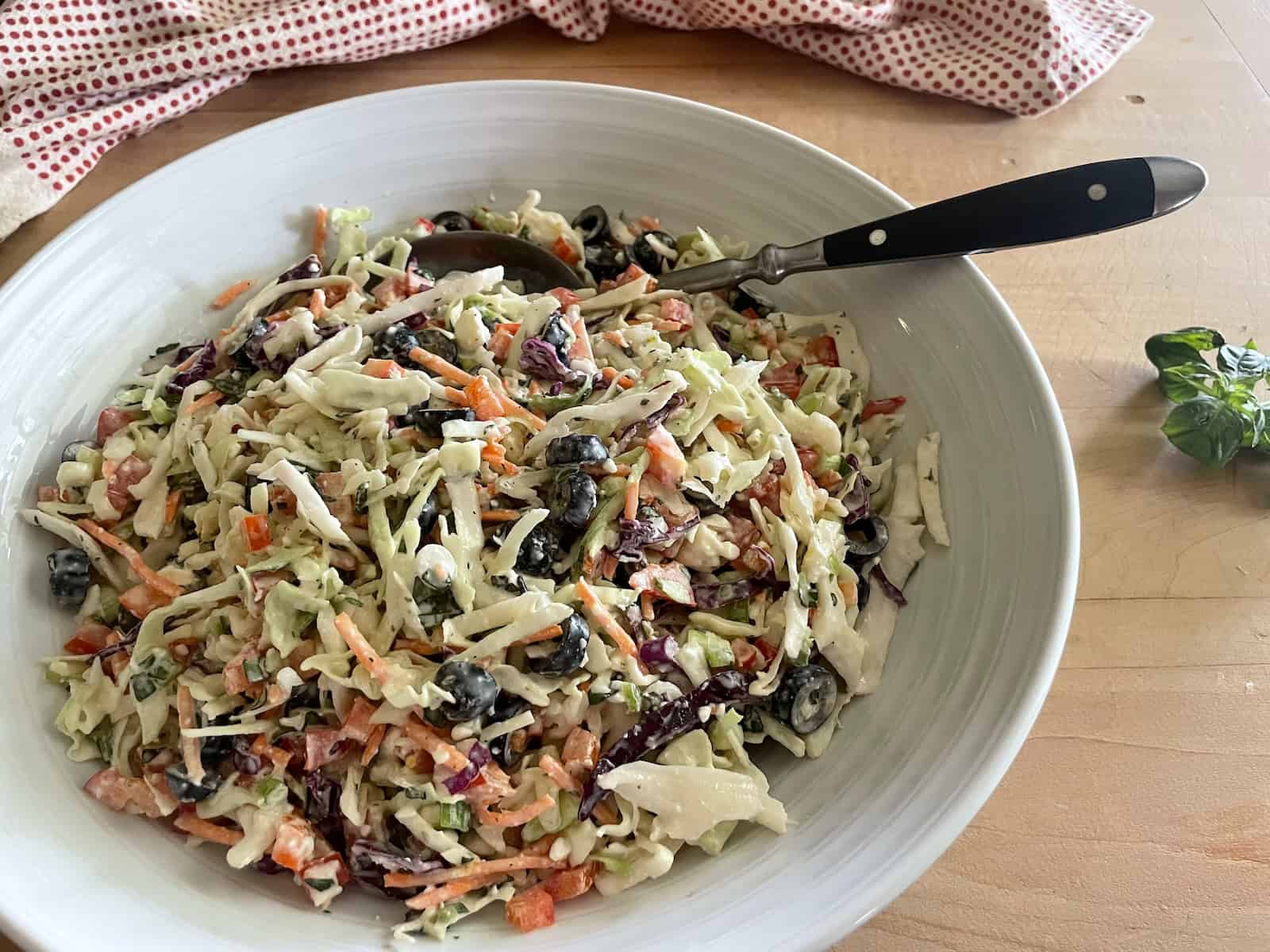 Mediterranean Lemony Buttermilk Coleslaw in a serving bowl