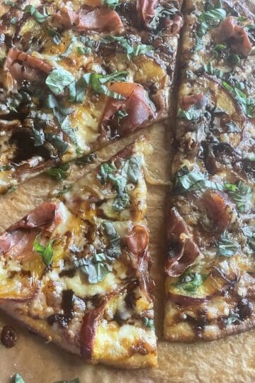Peach Prosciutto Pizza with Honey Balsamic Reduction and Basil