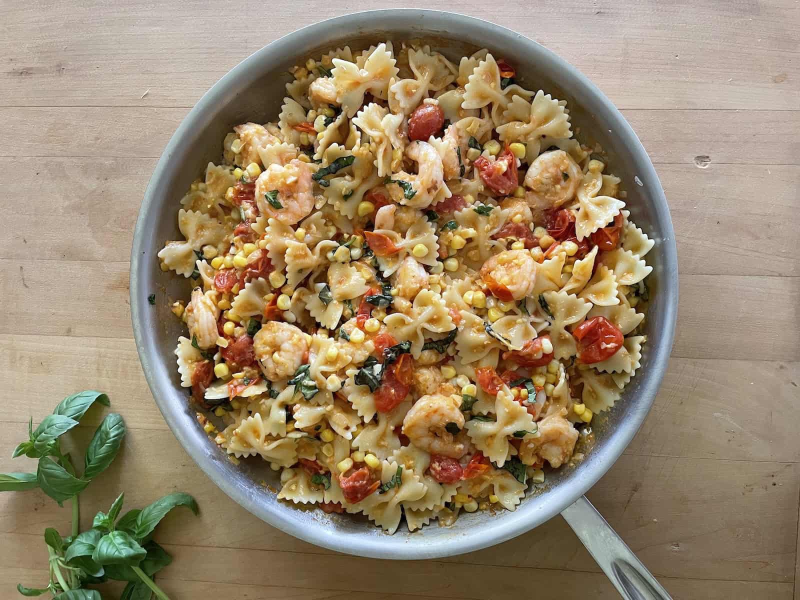 Summer Sweet Corn, Tomato and Shrimp Pasta in skillet