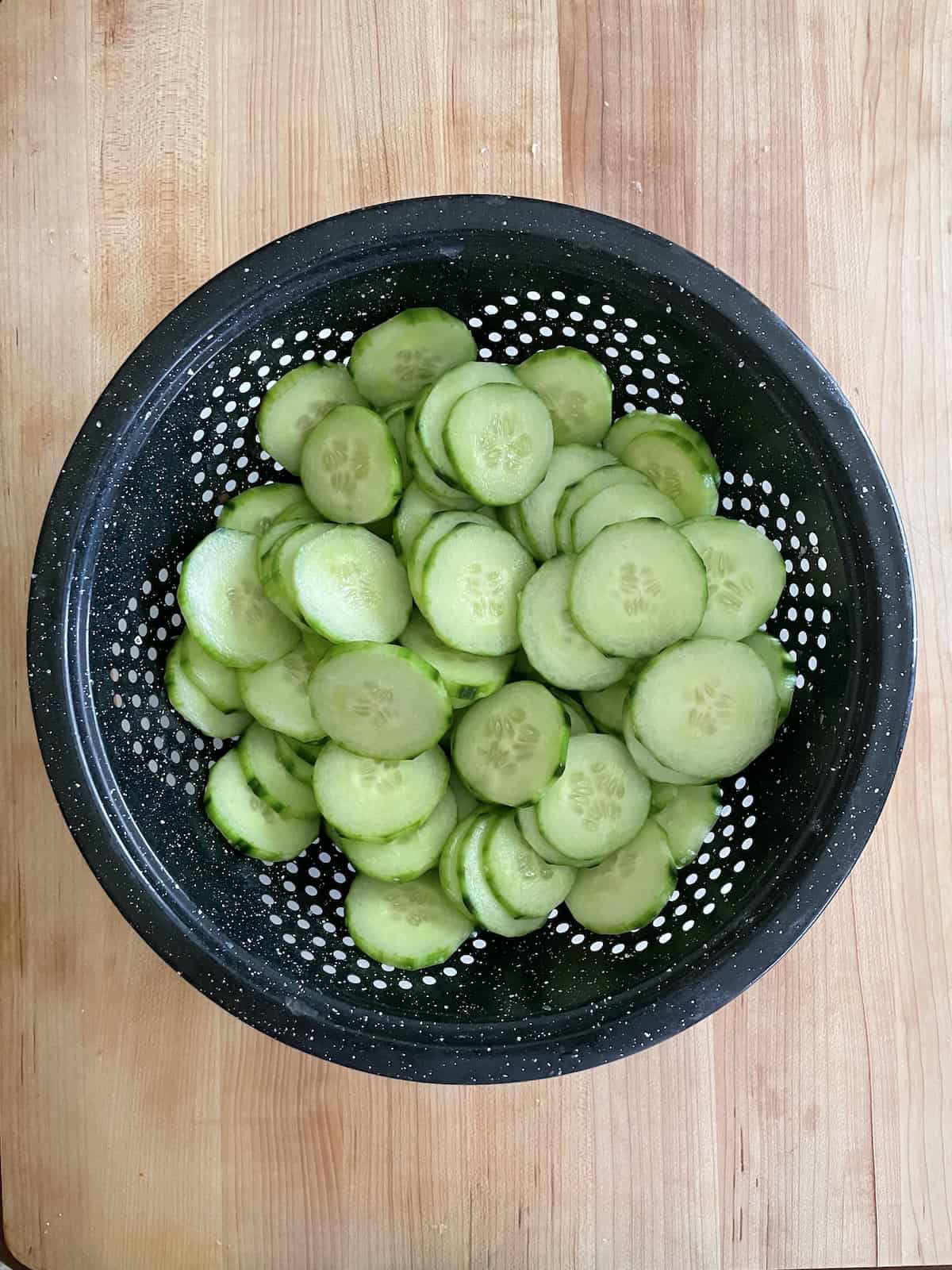 cucumbers in colander