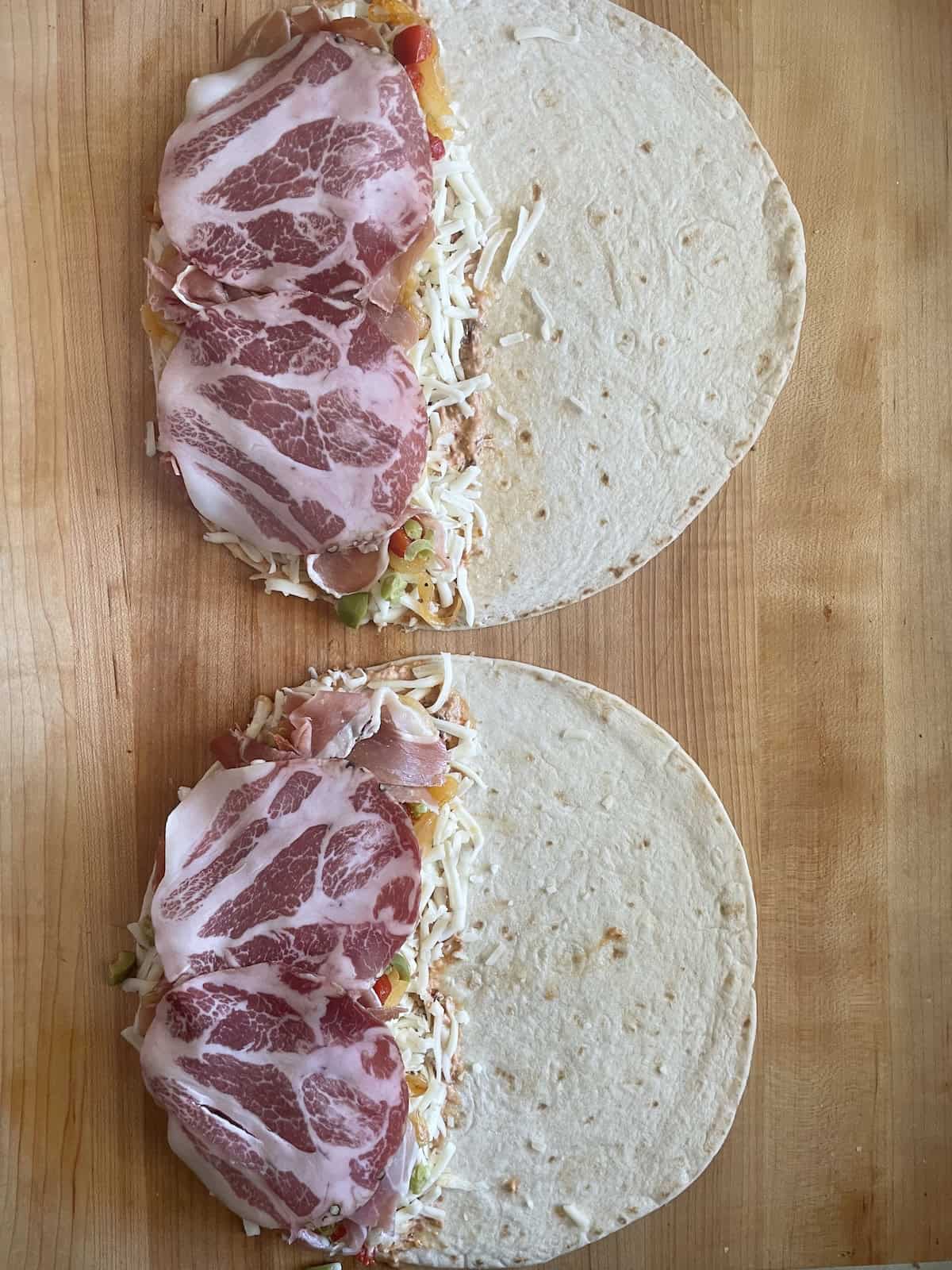 adding coppa salami