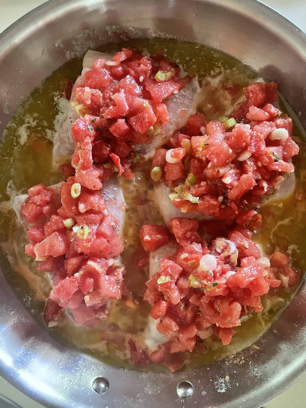 red snapper fillts with tomato topping