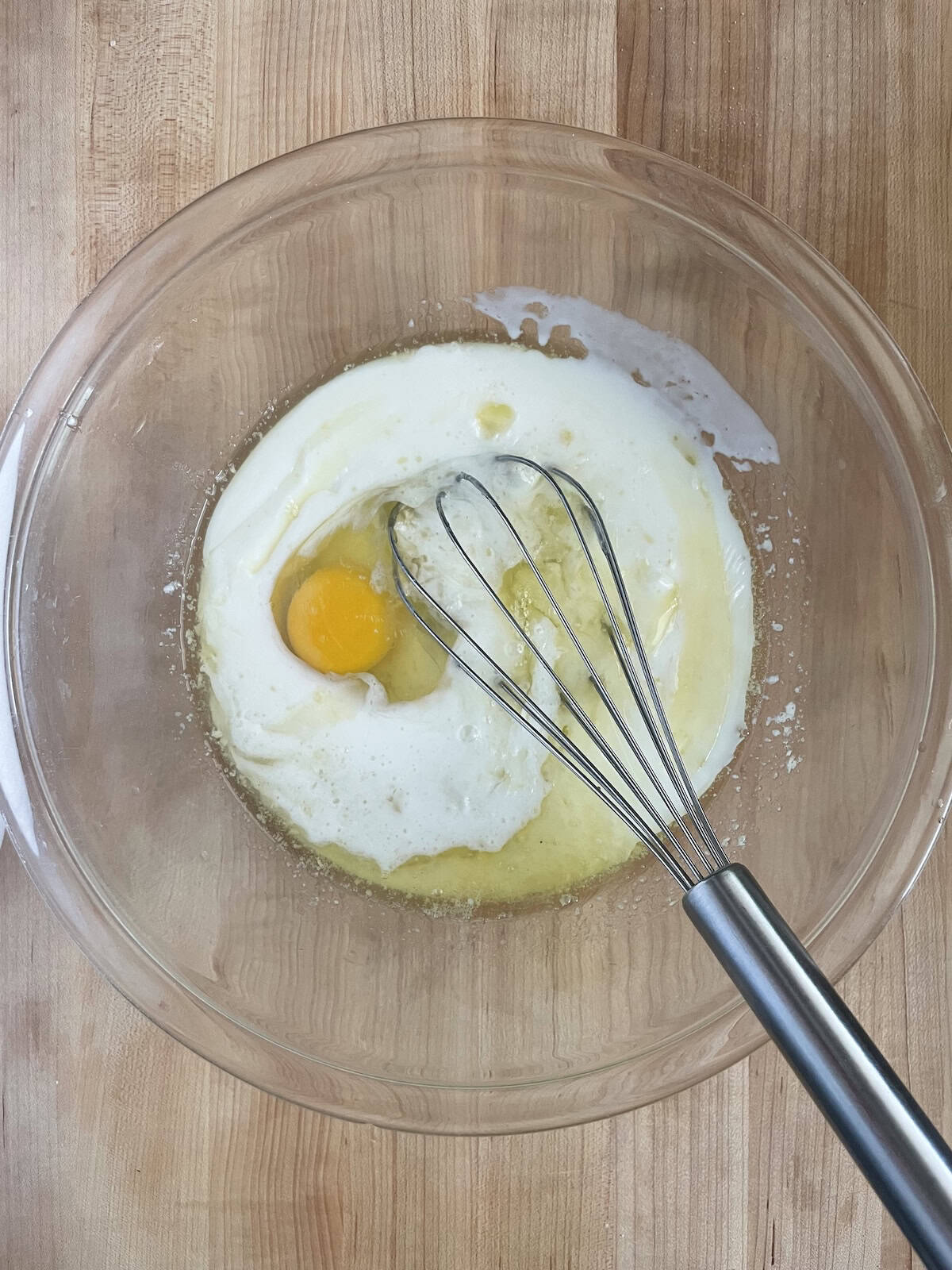 adding buttermilk and eggs