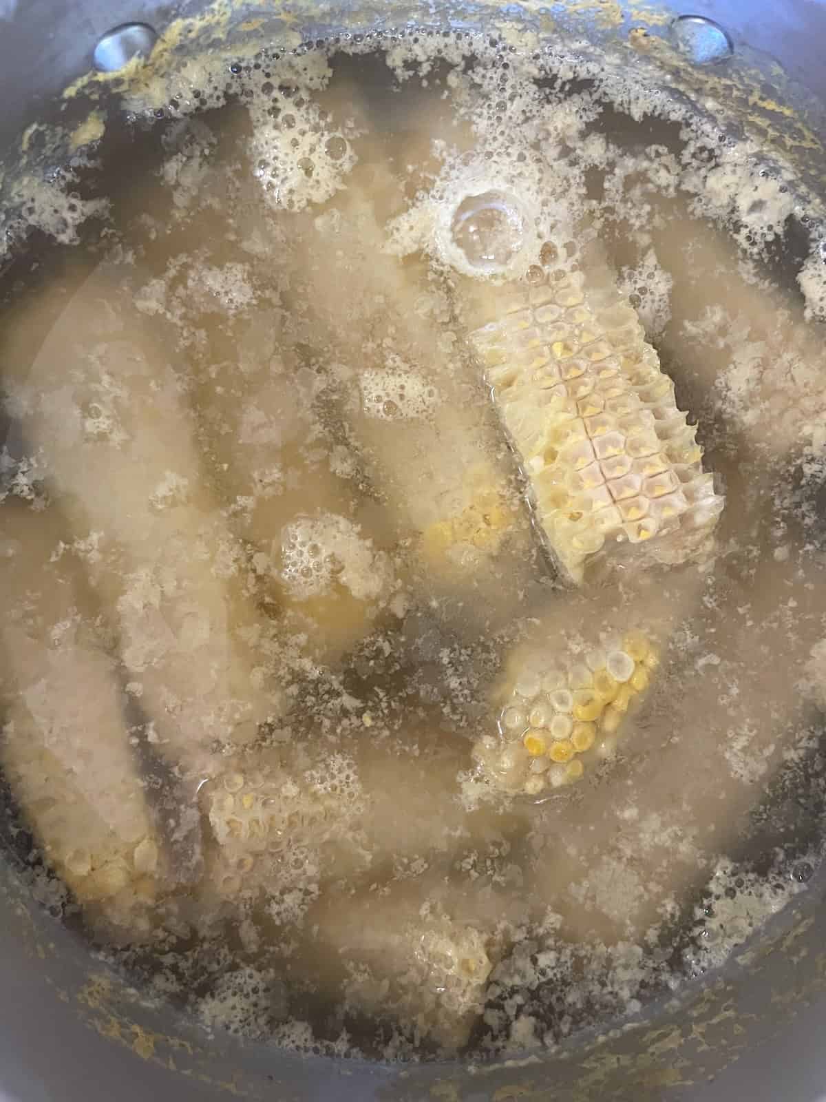 Chicken stock with corn cobs