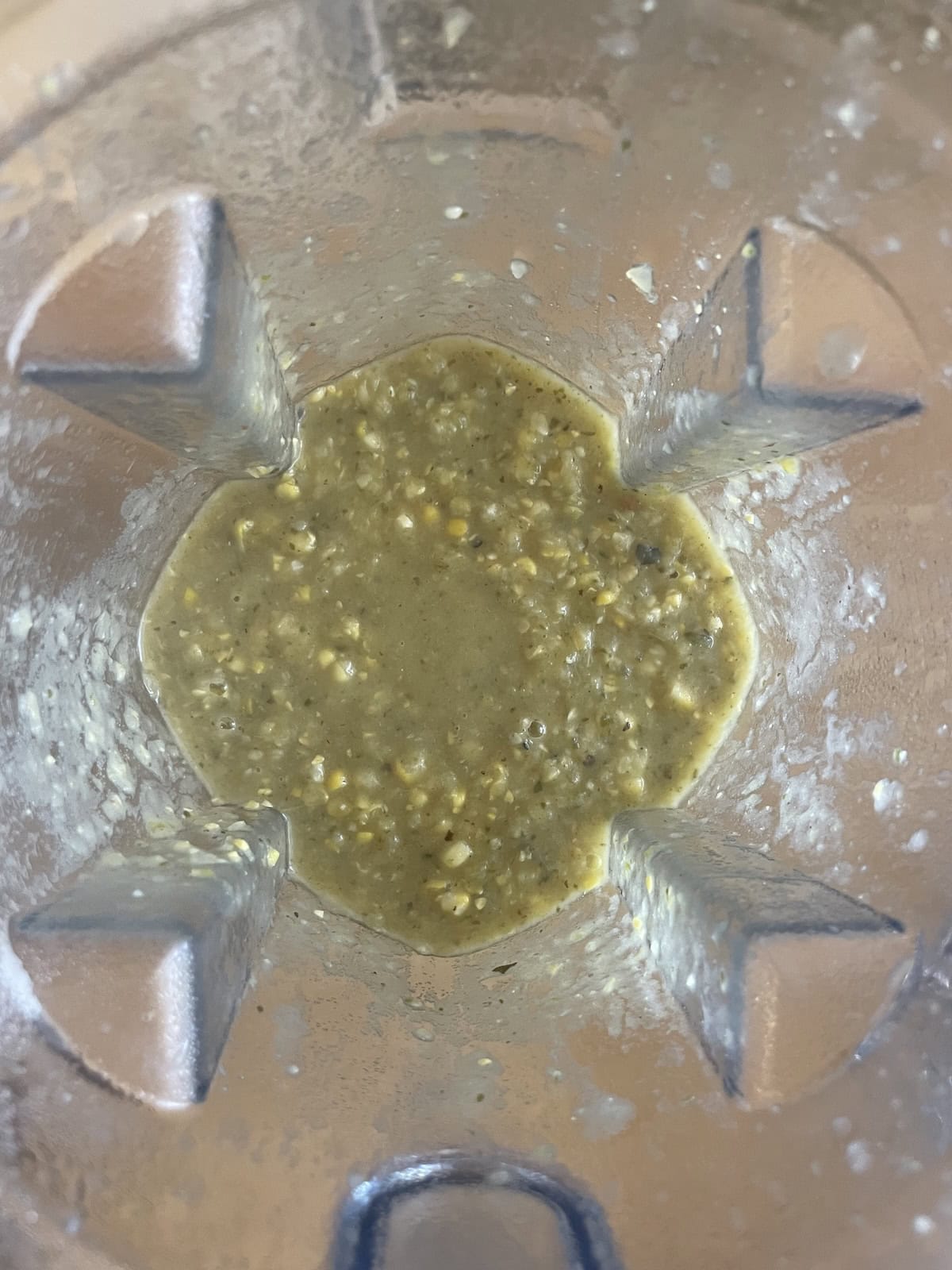 half of soup partially blended in blender