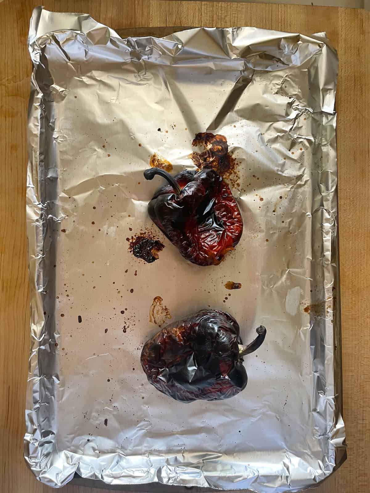 roasted red peppers on baking sheet