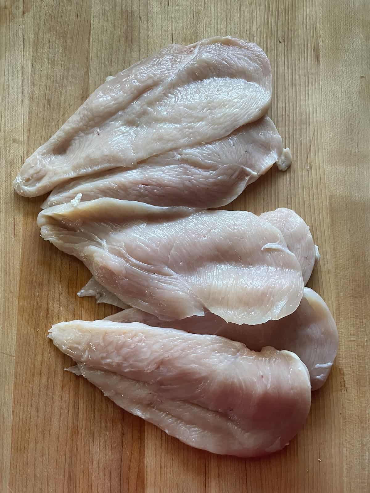 chicken breasts cut in half