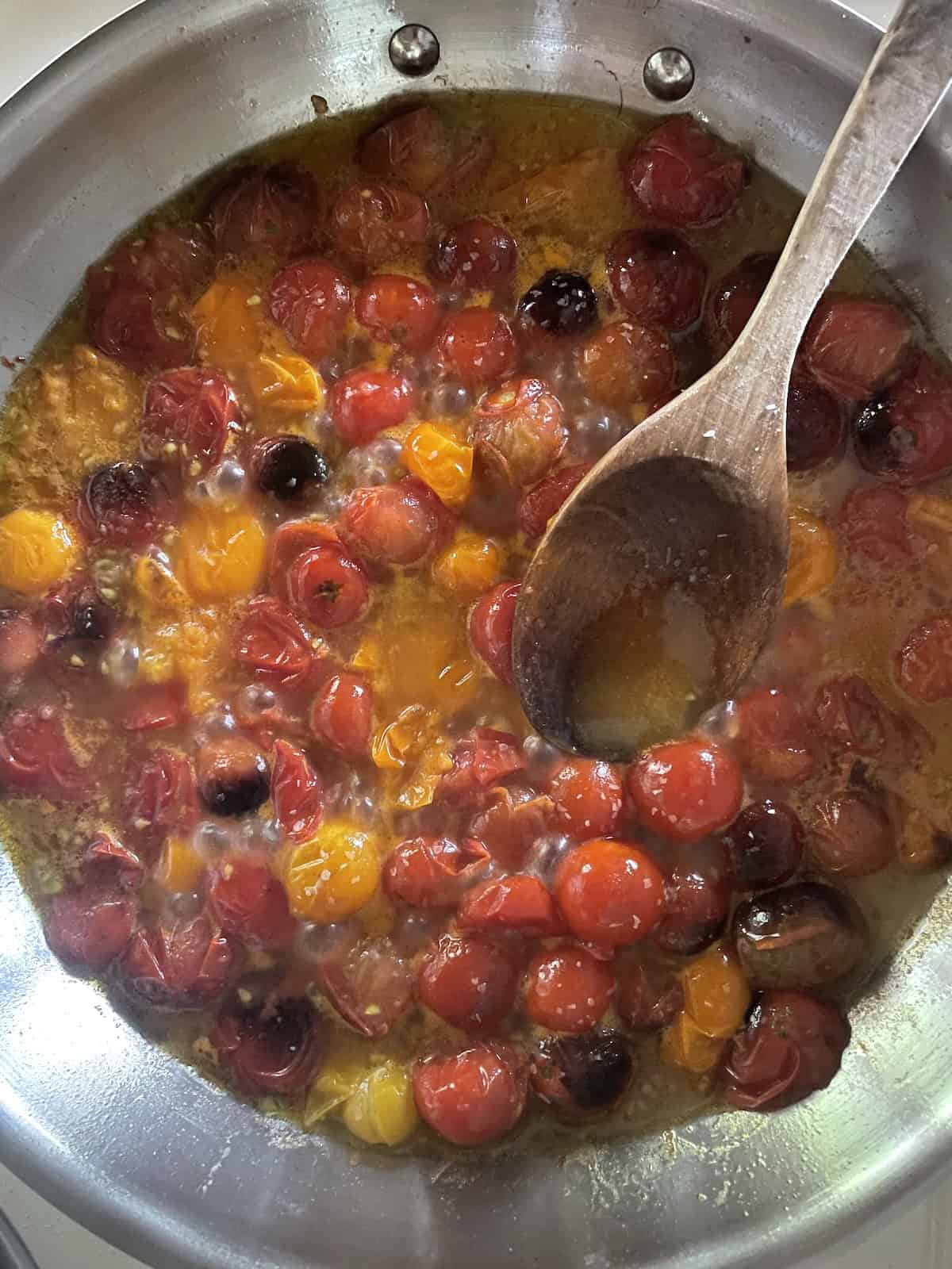 cooked tomatoes in skillet