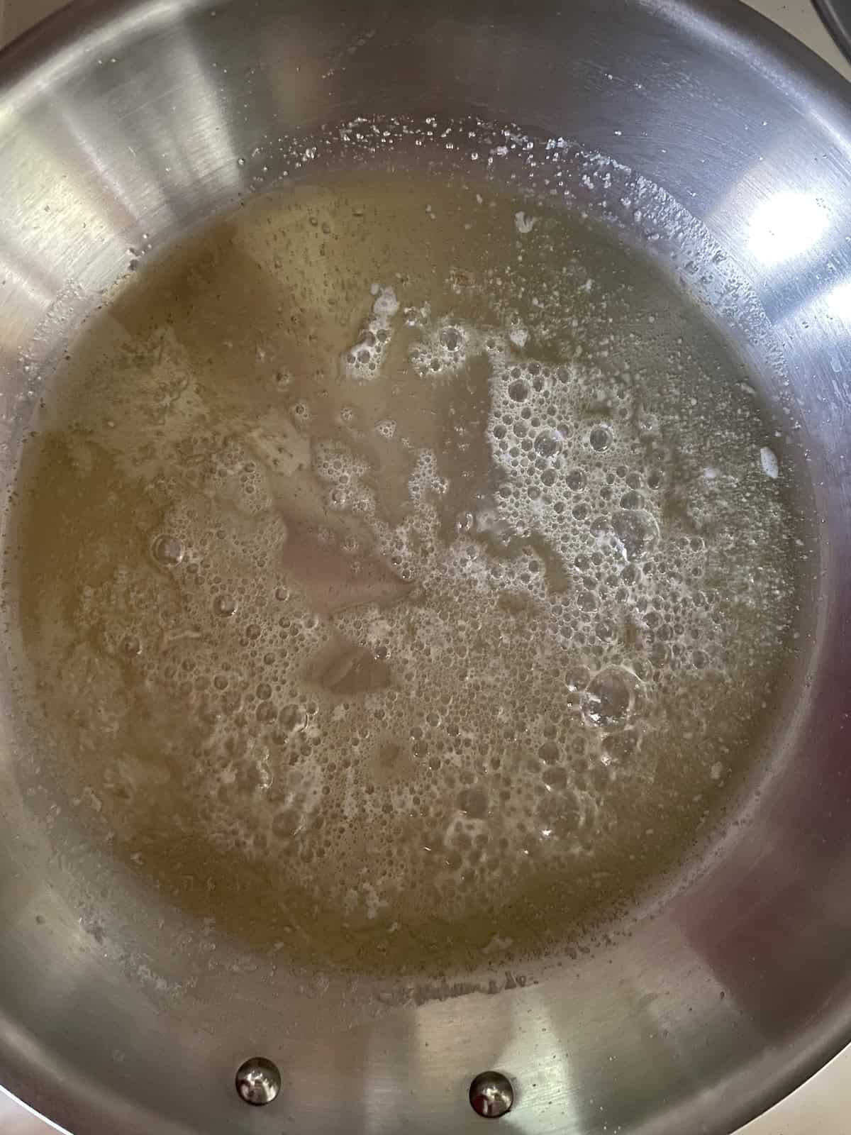 add butter and oil to skillet