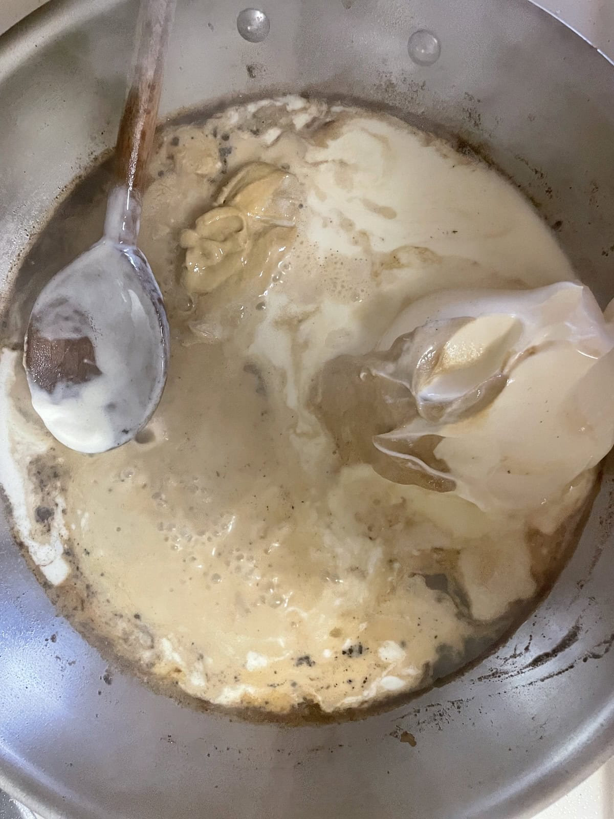 add creme fraiche and mustard to skillet