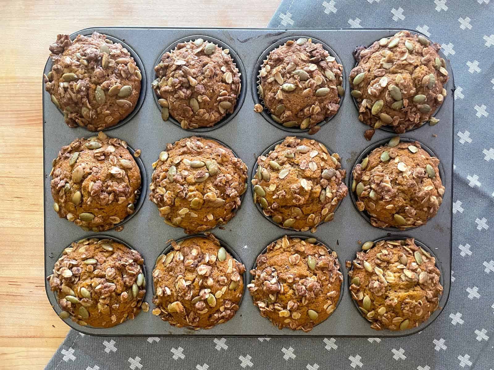 Brown Butter Pumpkin Maple Muffins with Pepita Streusel in muffin tin