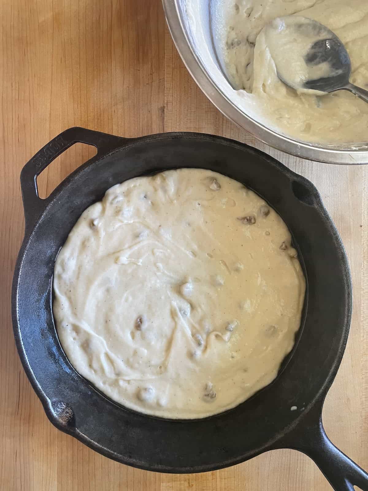 adding batter to baking pan