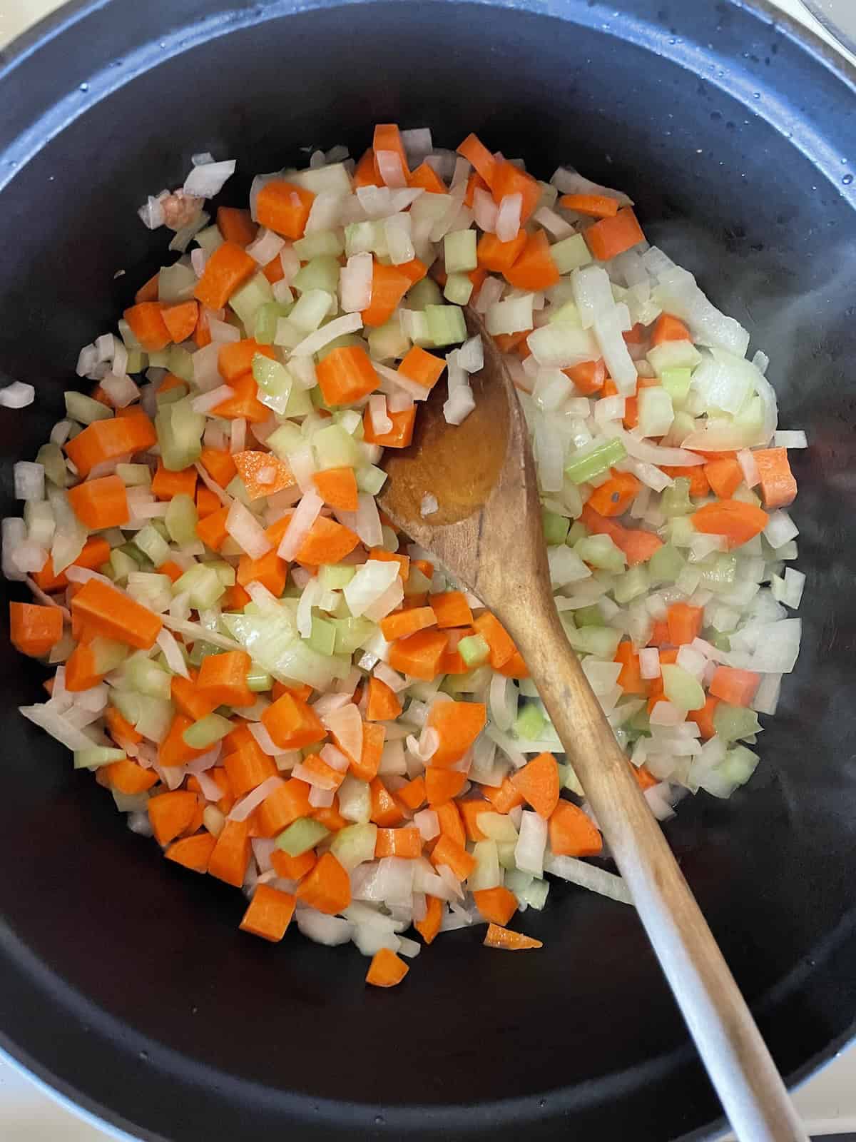 saute carrots, onions and celery