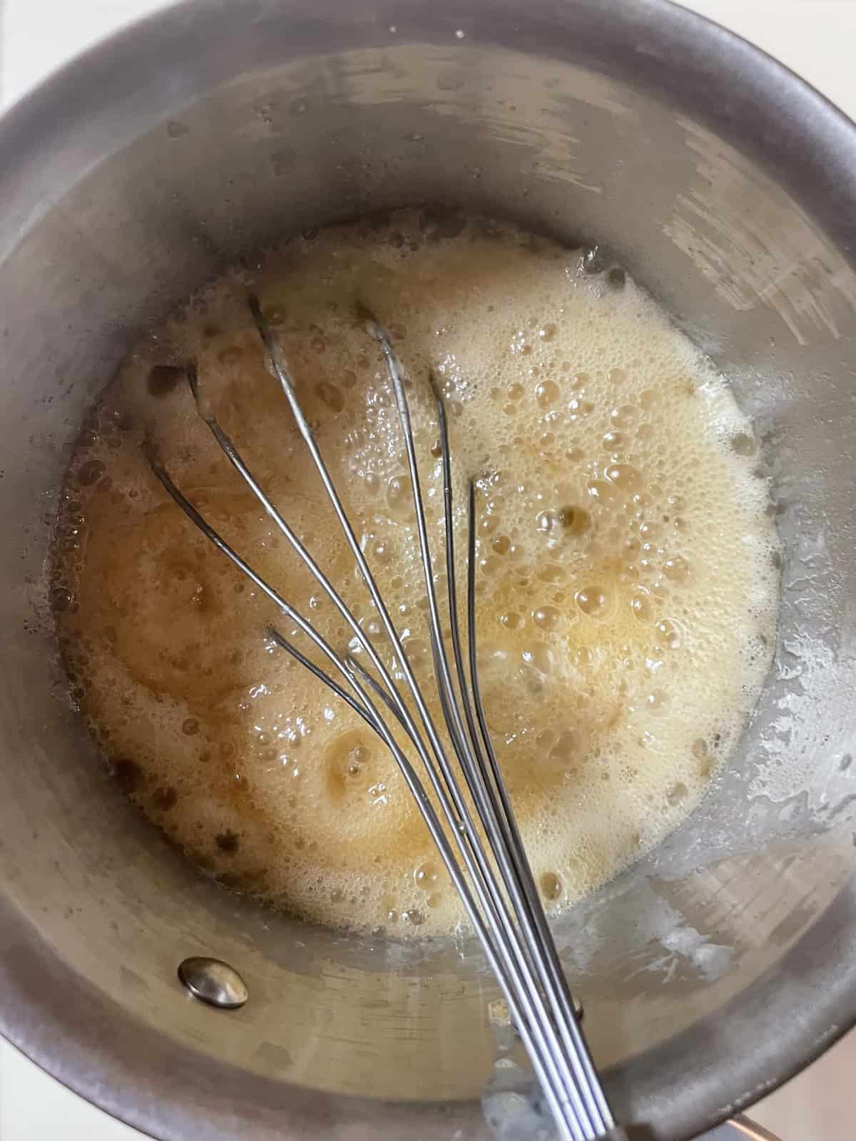 whisk in cream and vanilla