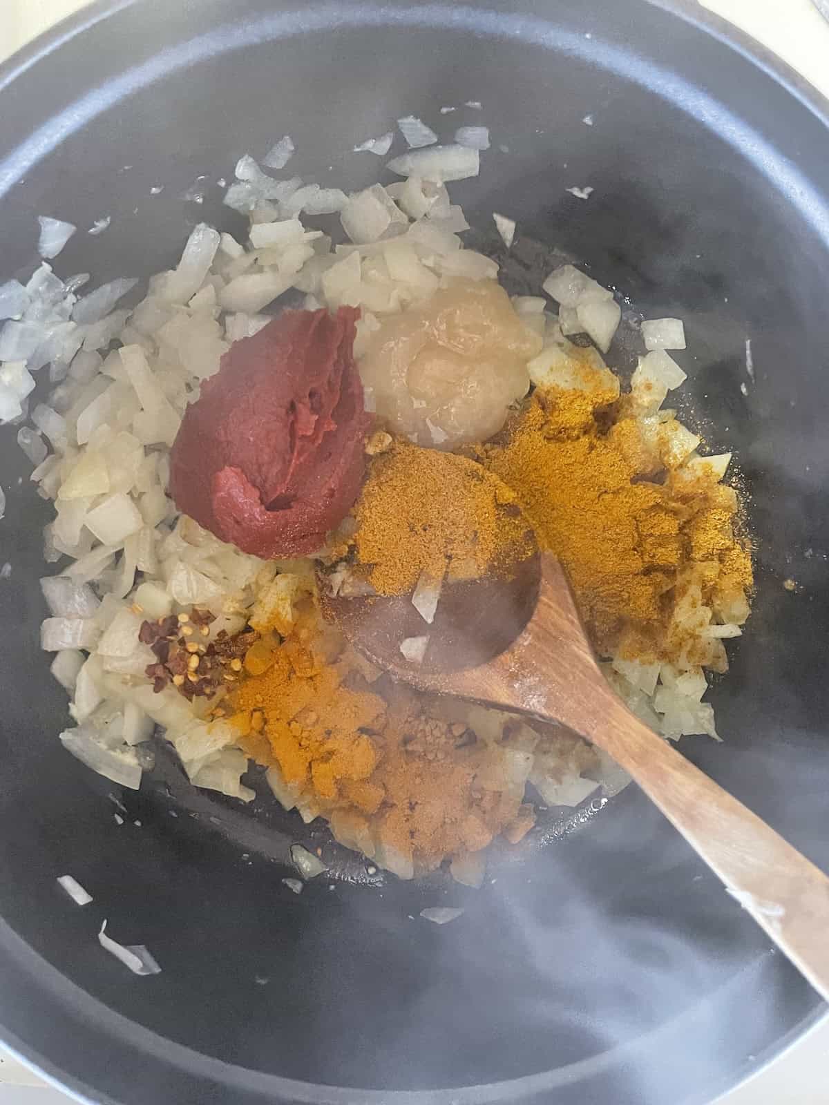 add spices and tomato paste