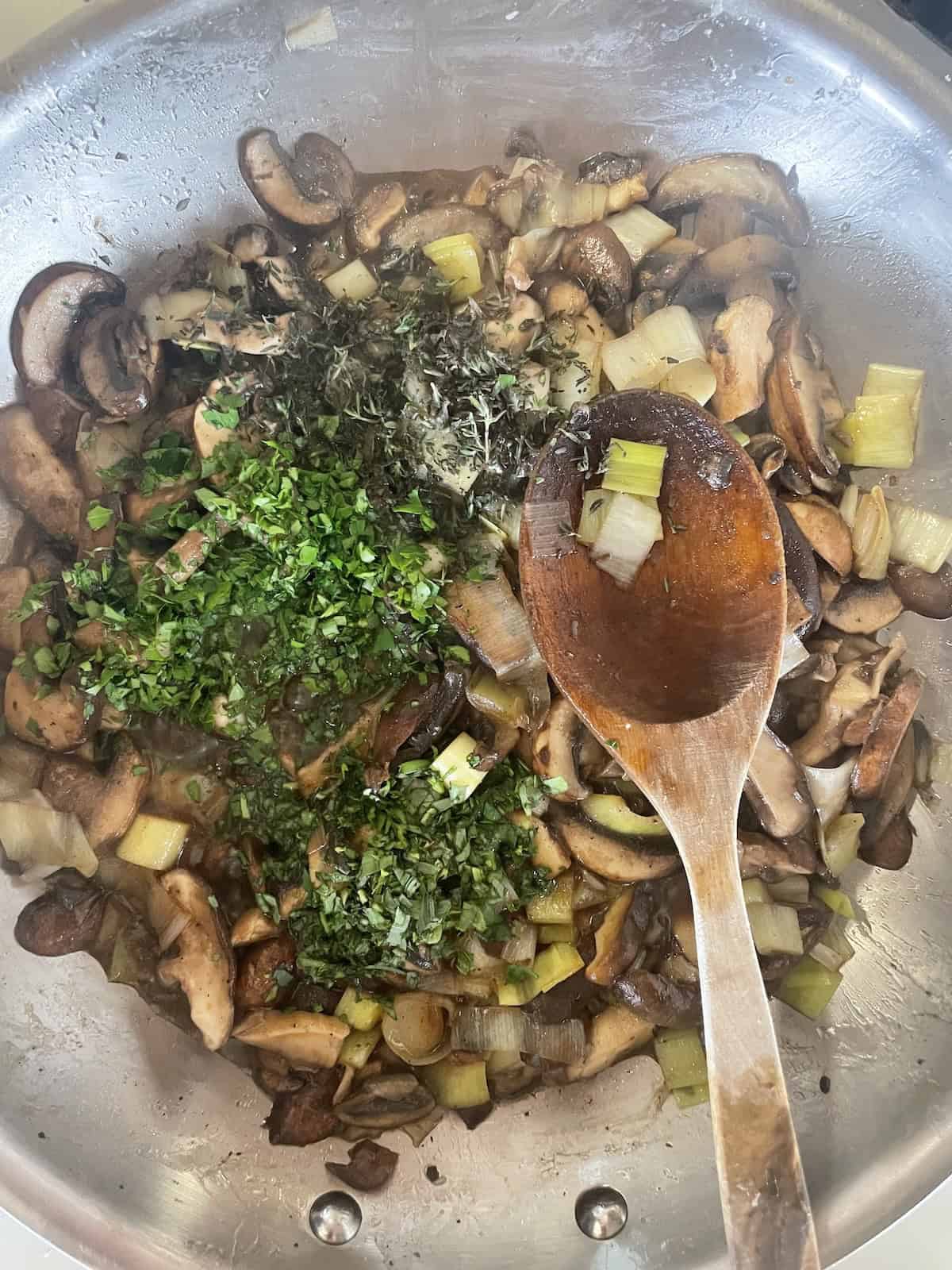 add herbs to skillet