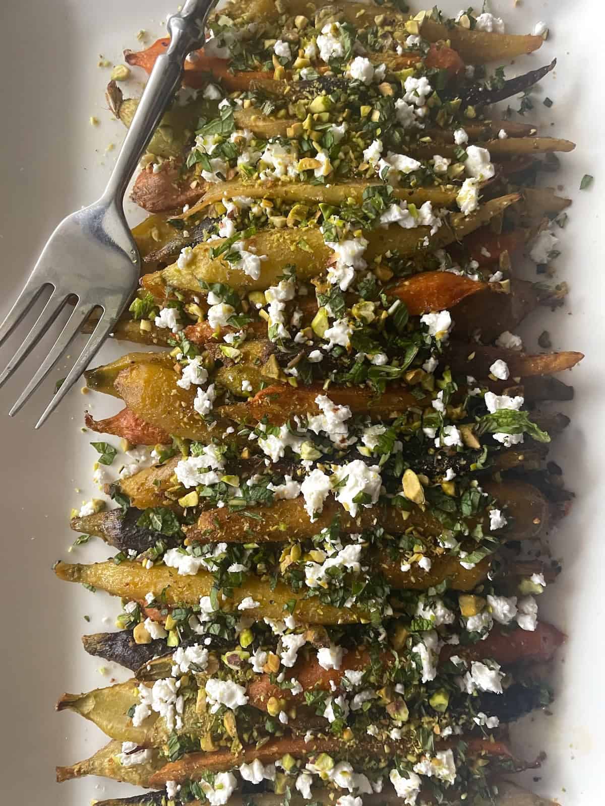 serve carrots with feta, pistachios and mint