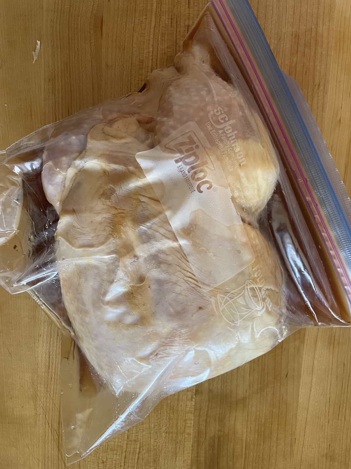 Chicken and brine in zipper bag