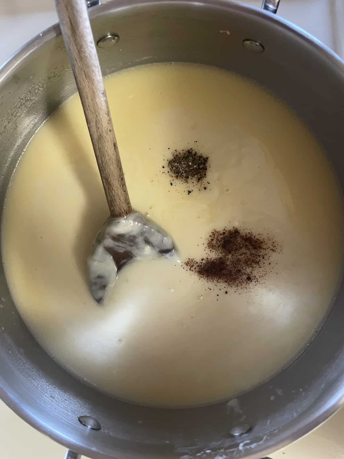 add nutmeg and pepper