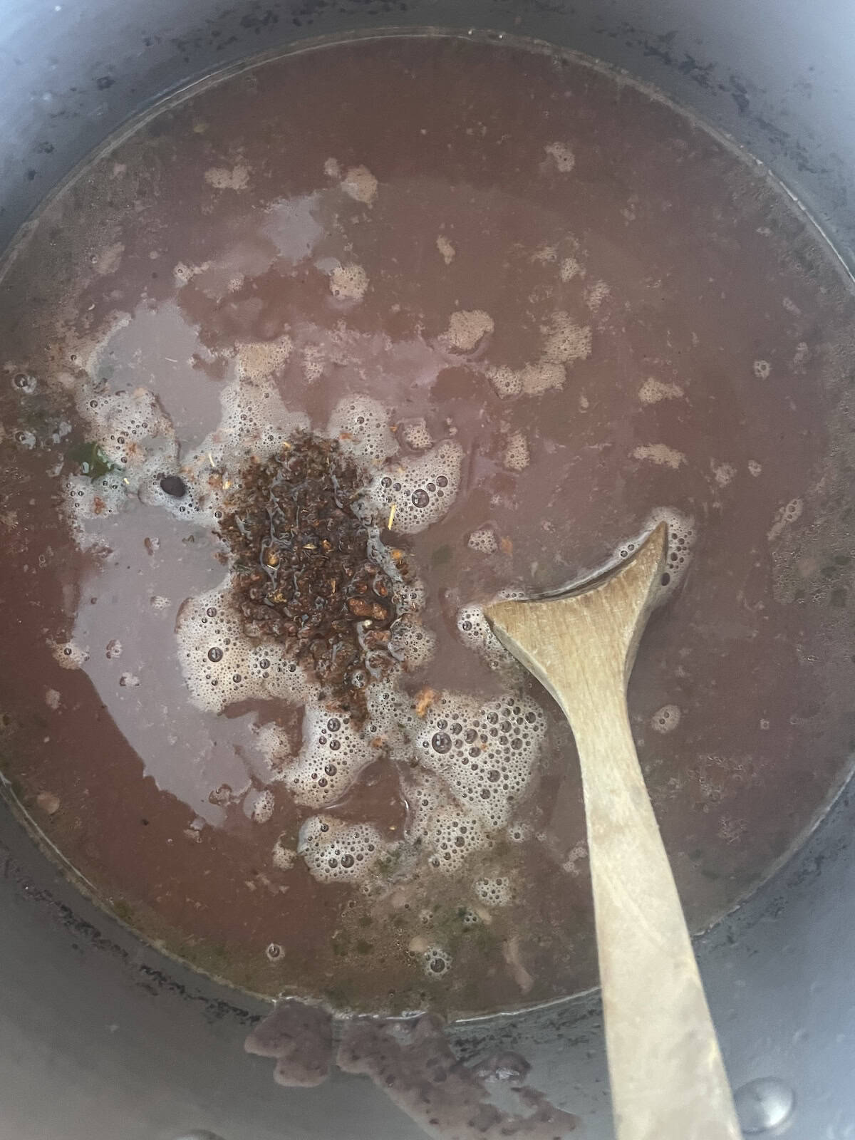 add spices and ham to the pot