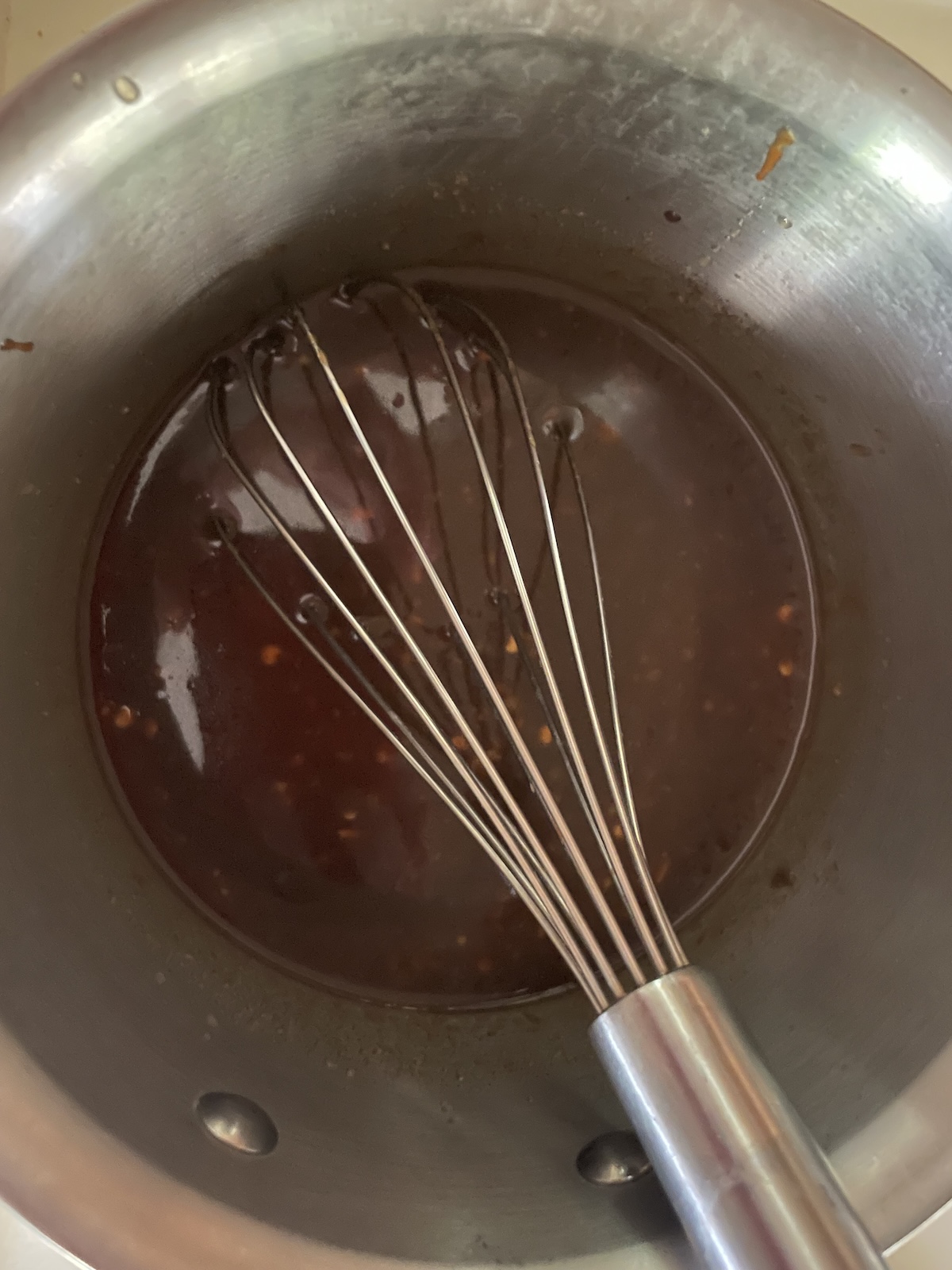 sauce ingredients mixed and reduced