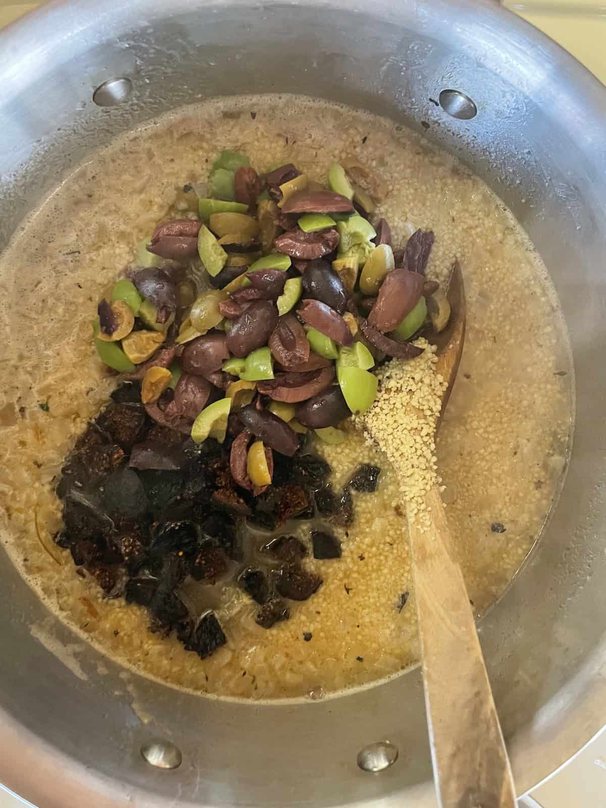 add olives and figs to pan