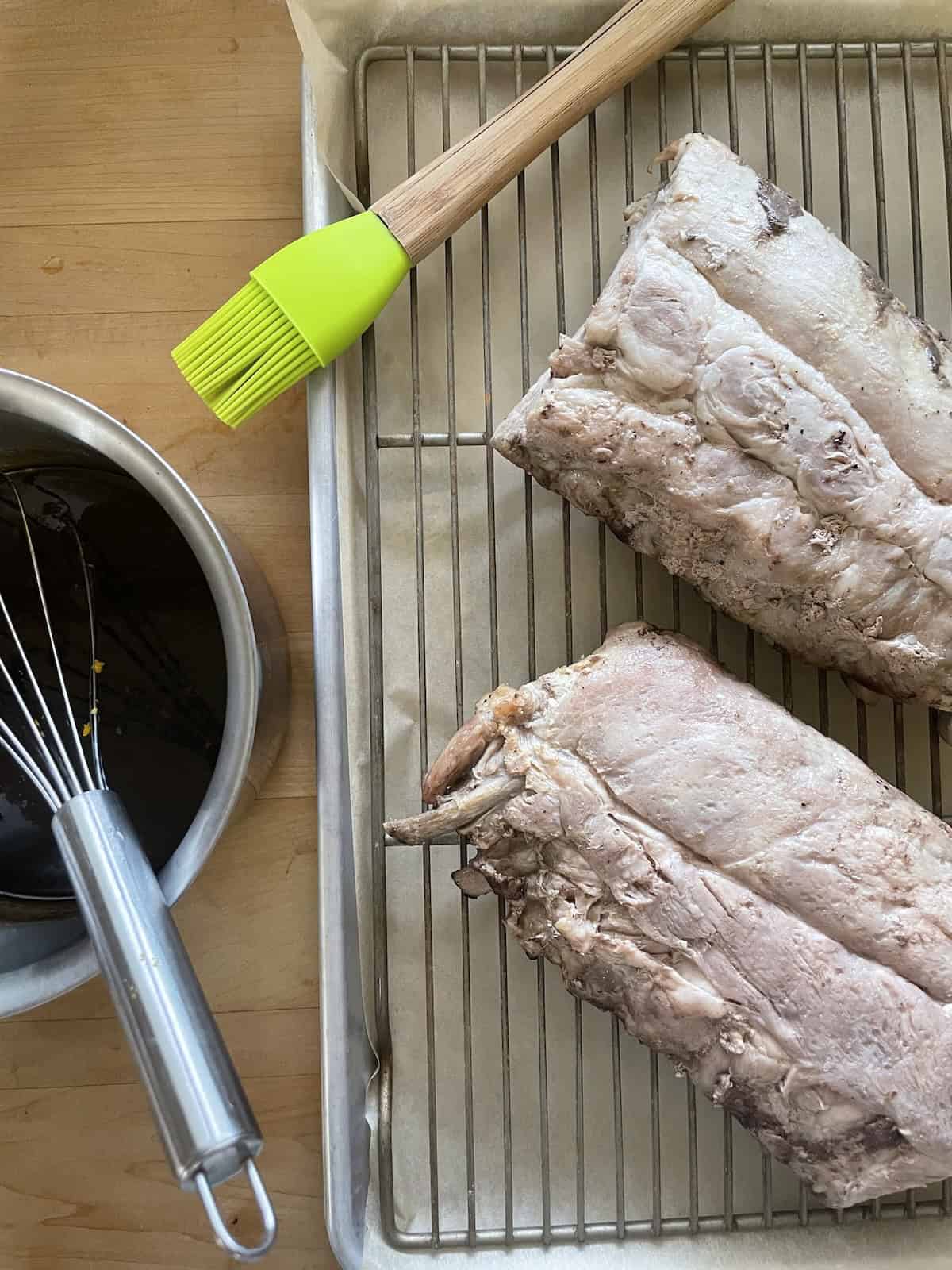 cooked ribs on a baking rack