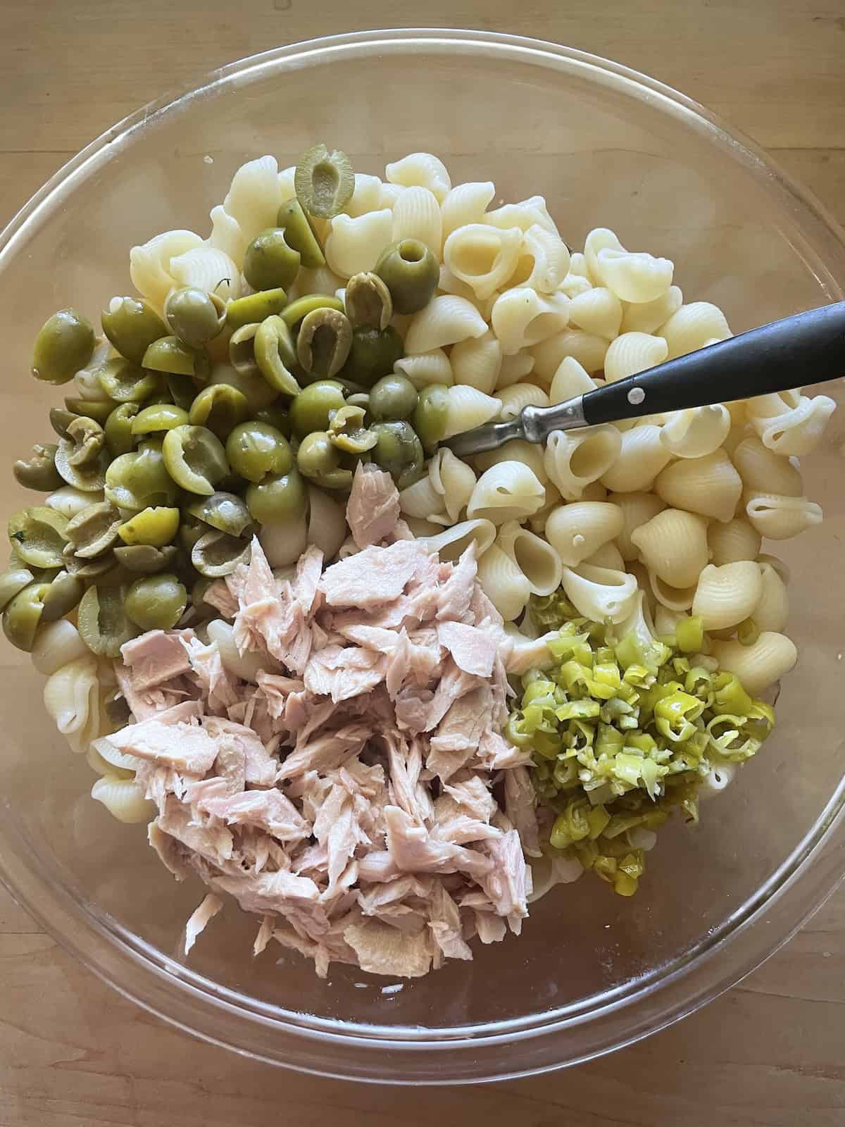 add olives, tuna and pepperoncini