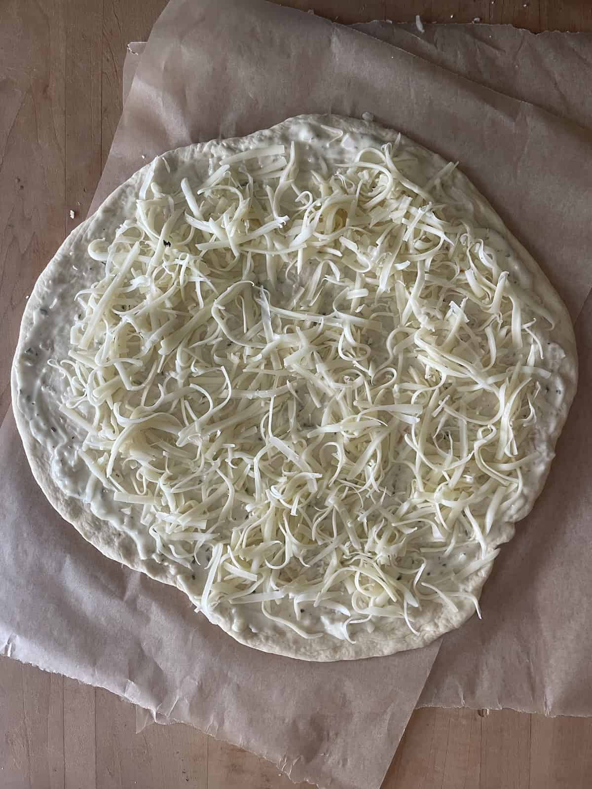 arrange fontina over sauce