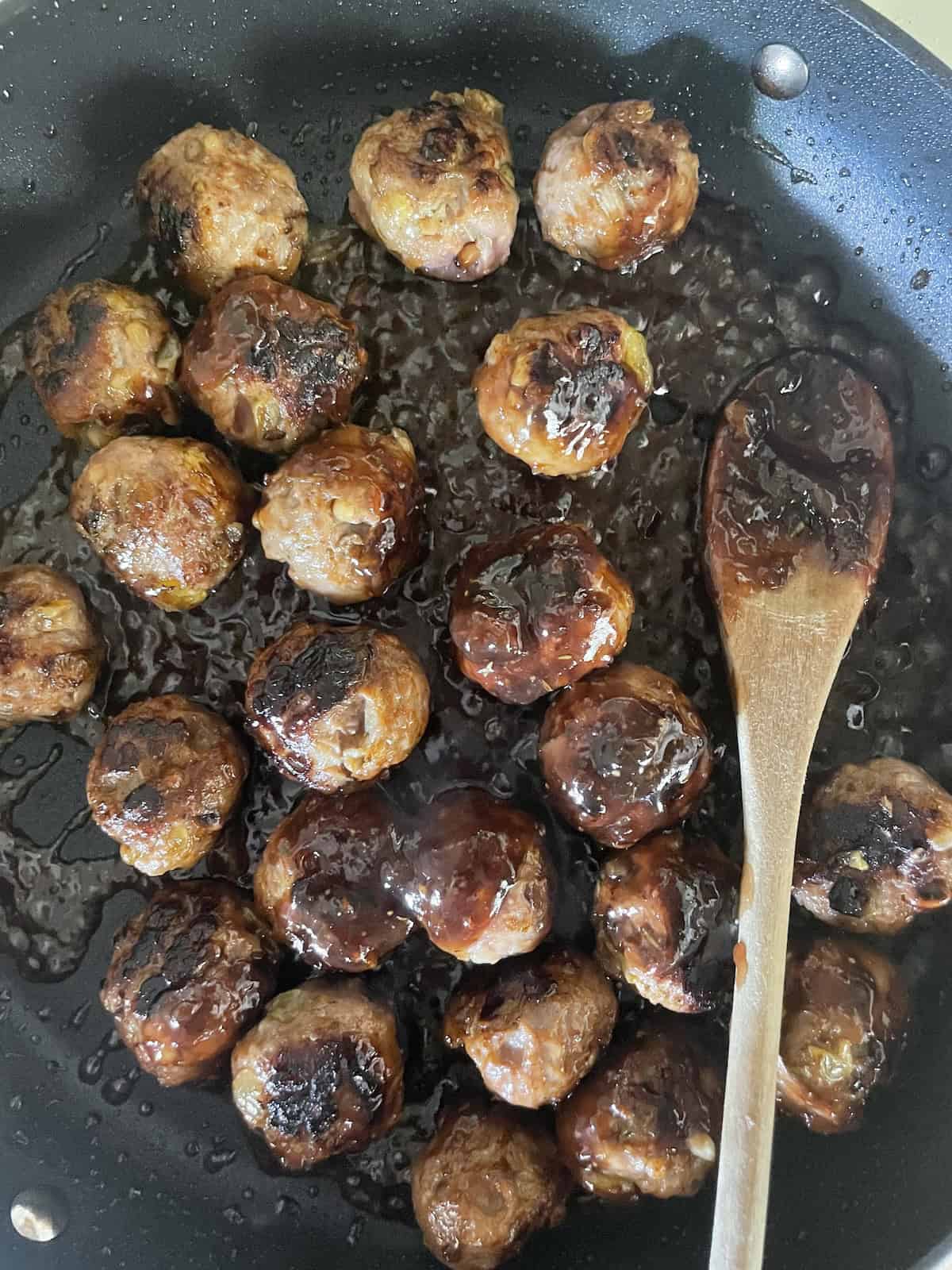 add glazd to browned meatballs
